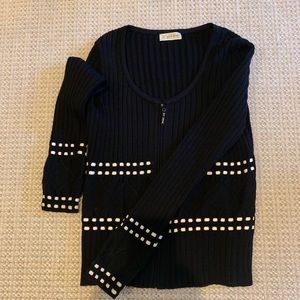 St John black cardigan w/ white trim detail.